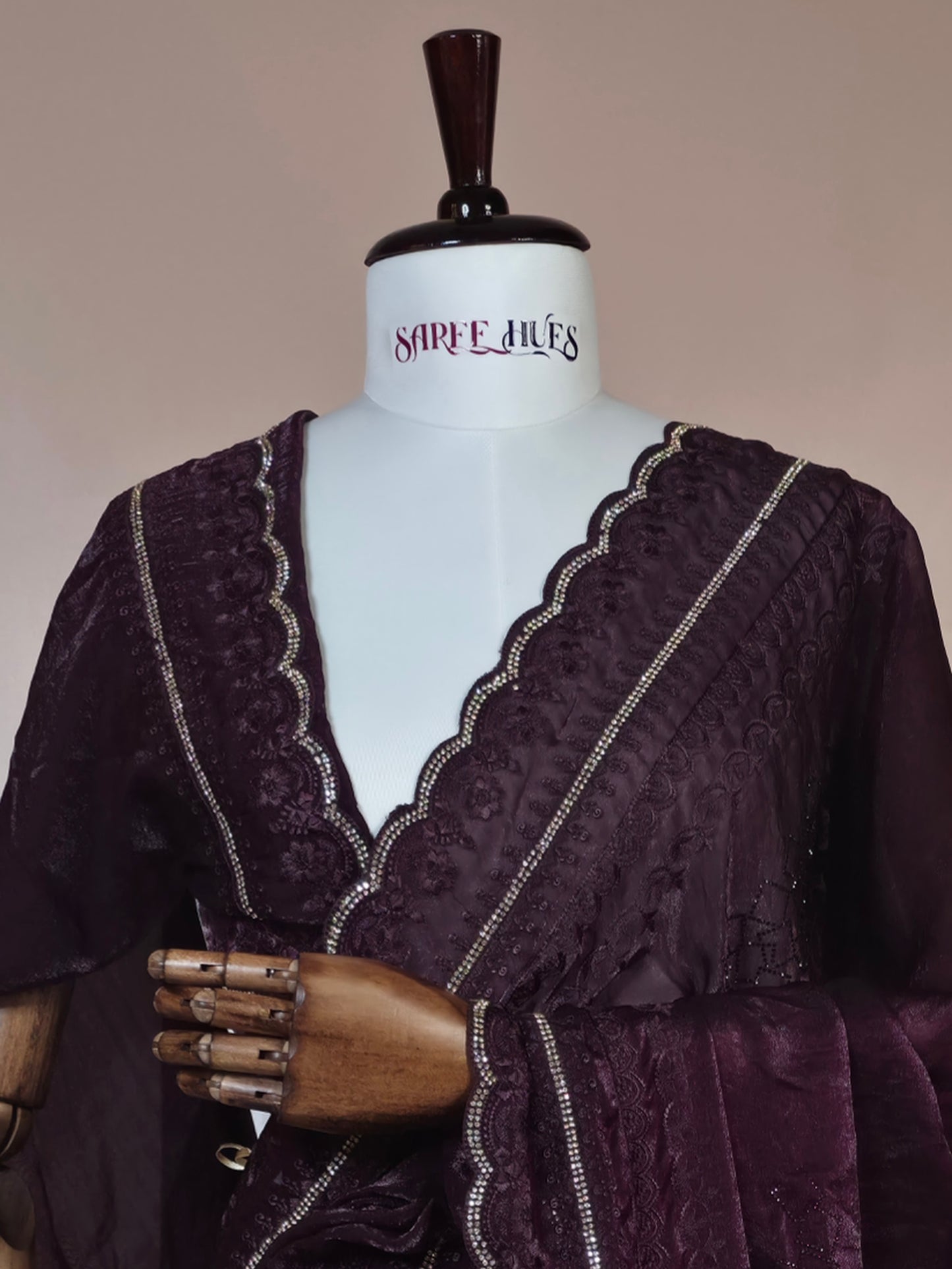 “Royal Plum Velvet-Glow Saree – Elegance Wrapped in Jewel Tones”