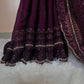 “Royal Plum Velvet-Glow Saree – Elegance Wrapped in Jewel Tones”