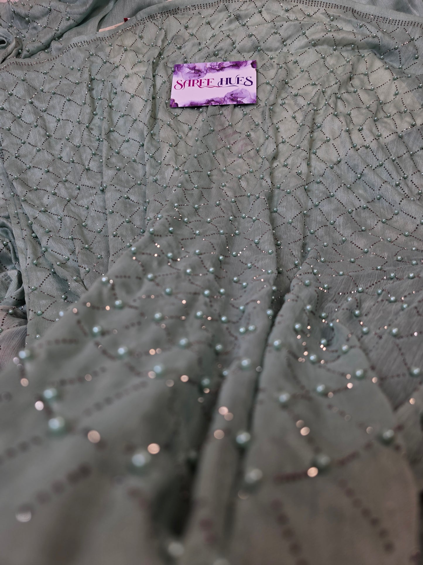 Ethereal Sage Green Shimmer Saree with Geometric Pearl & Stone Lattice Work